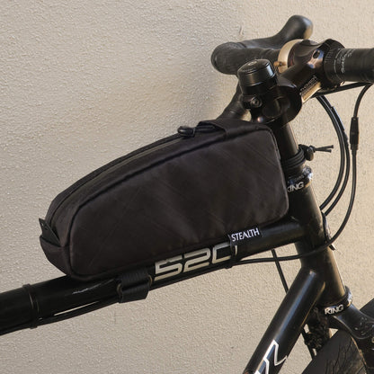 Top loader top tube bag on bike